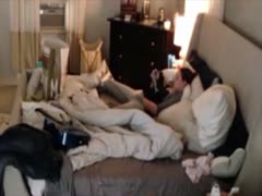 The wife masturbating on a hidden cam My hot slut mast in bed, using a phone to view porn